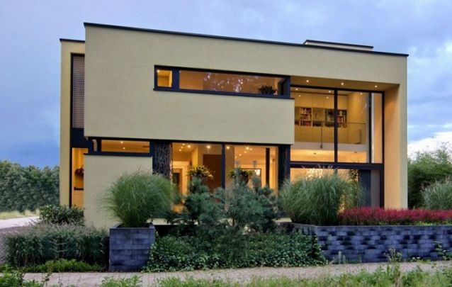 Projeto de casa com dois andares e uma fachada encantadora Projeto de casa com dois andares e uma fachada encantadora